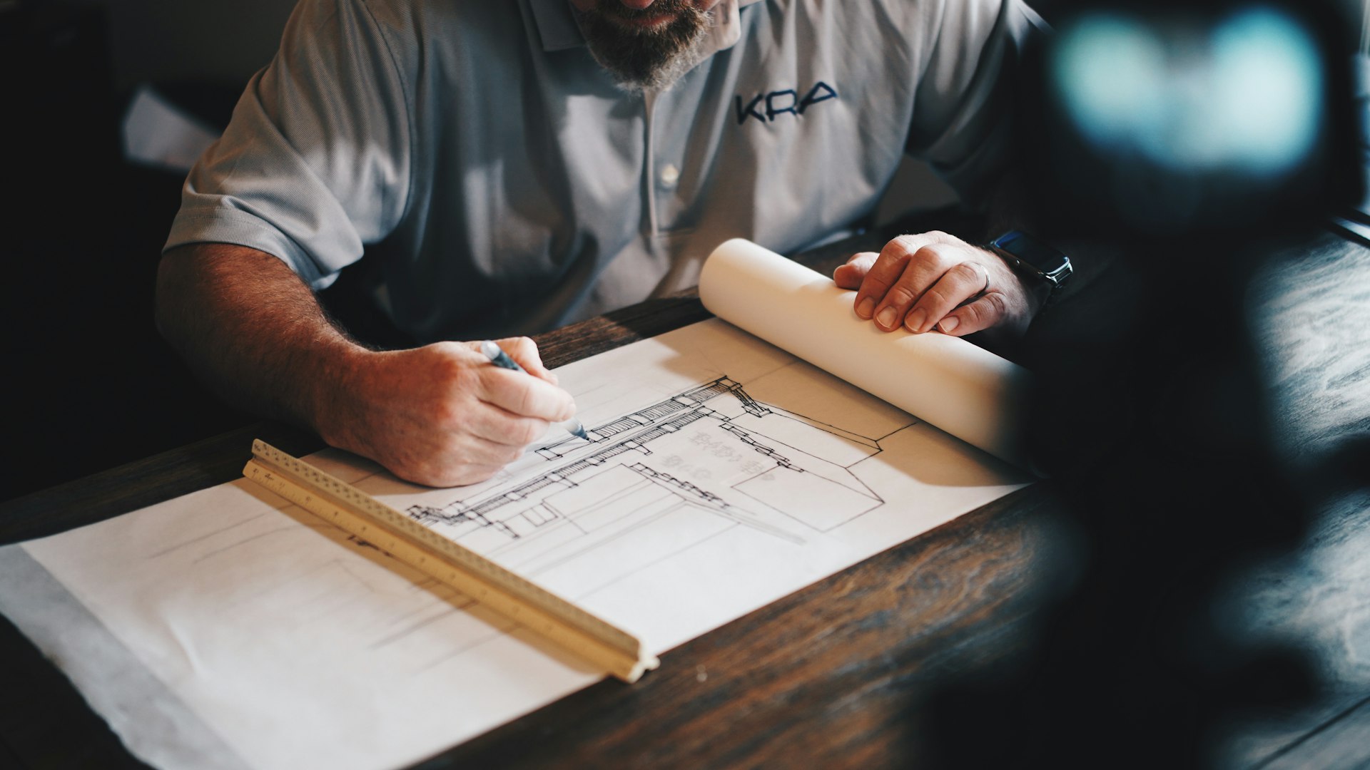 Engineer reviewing drawings
